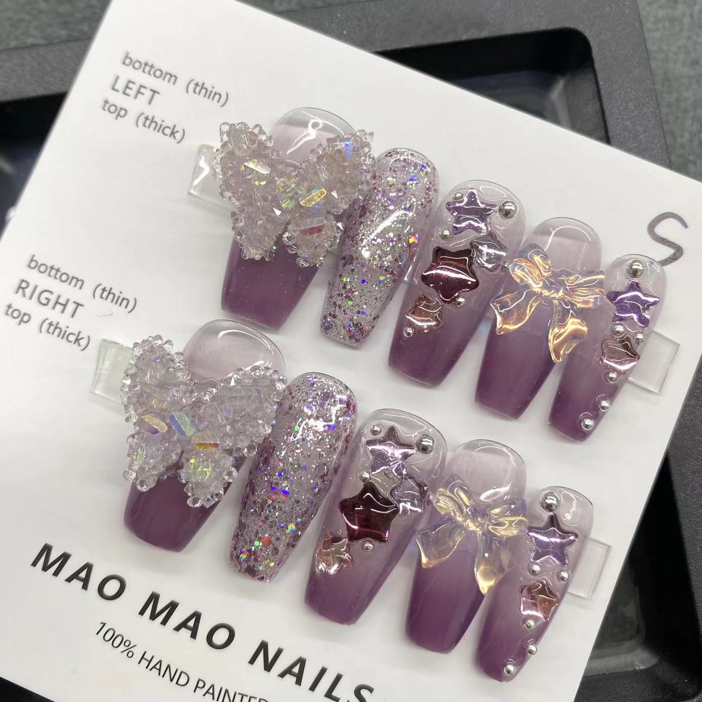 Autocollants pour ongles en forme de papillon en améthyste pure portés à la main