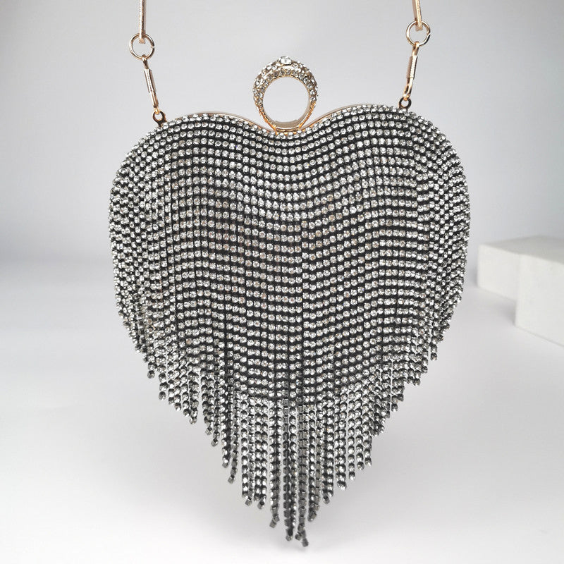 Sac à main pour femme avec pompons et diamants