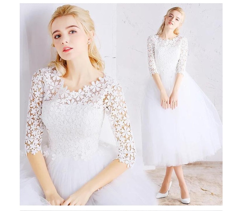 Vestido de novia blanco con falda abullonada