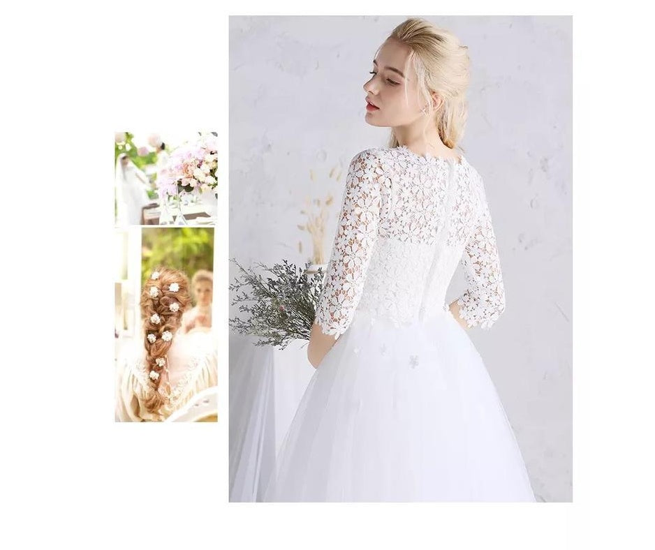 Vestido de novia blanco con falda abullonada