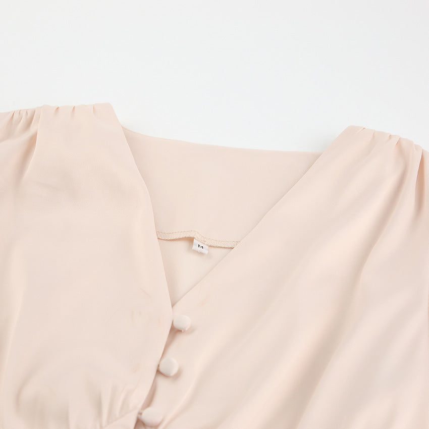 Robe moulante à manches lanternes et taille fine