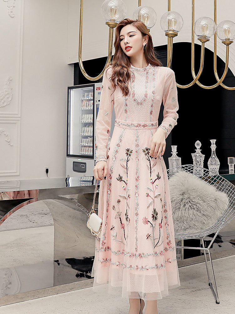 Robe de cocktail élégante à manches longues