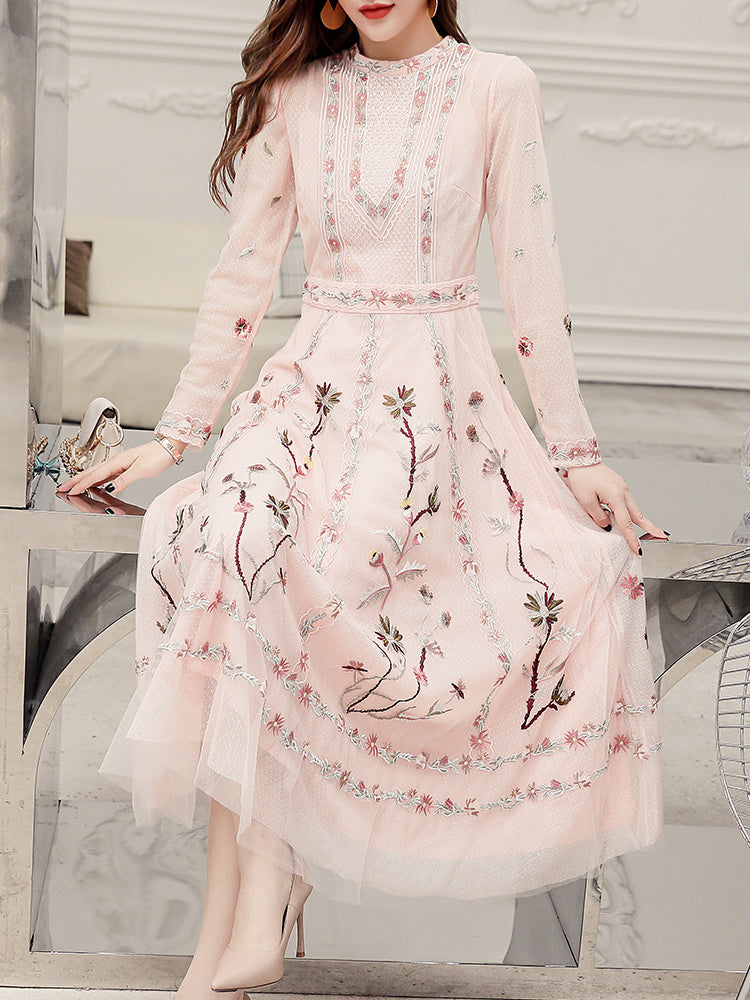 Robe de cocktail élégante à manches longues