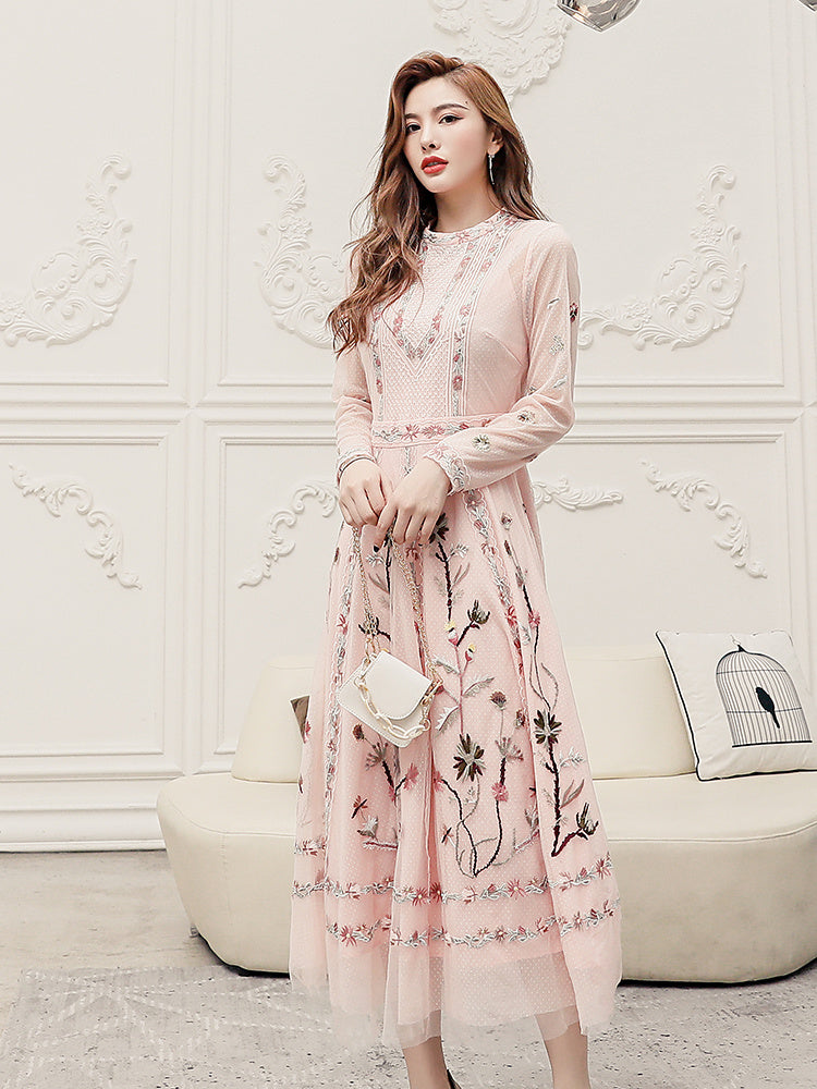 Robe de cocktail élégante à manches longues