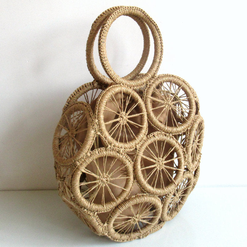 El nuevo bolso tejido con cuerda de papel hueco circular, paja diagonal