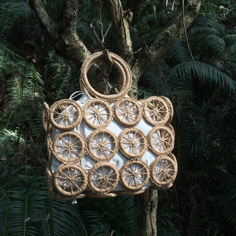 El nuevo bolso tejido con cuerda de papel hueco circular, paja diagonal