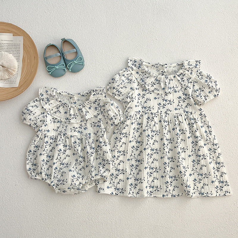Vestido de niña pequeño con estampado floral y personalidad de moda