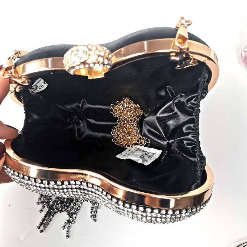 Sac à main pour femme avec pompons et diamants