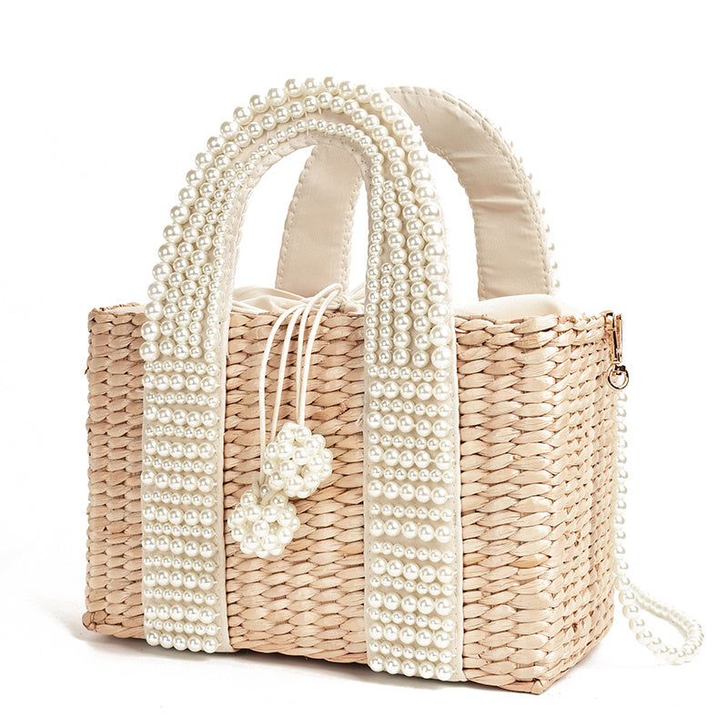 Bolso tejido de paja con perlas en diagonal