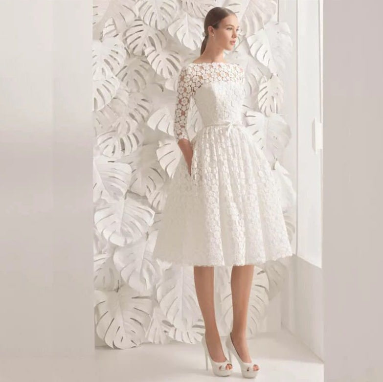 Vestido de novia blanco con falda abullonada