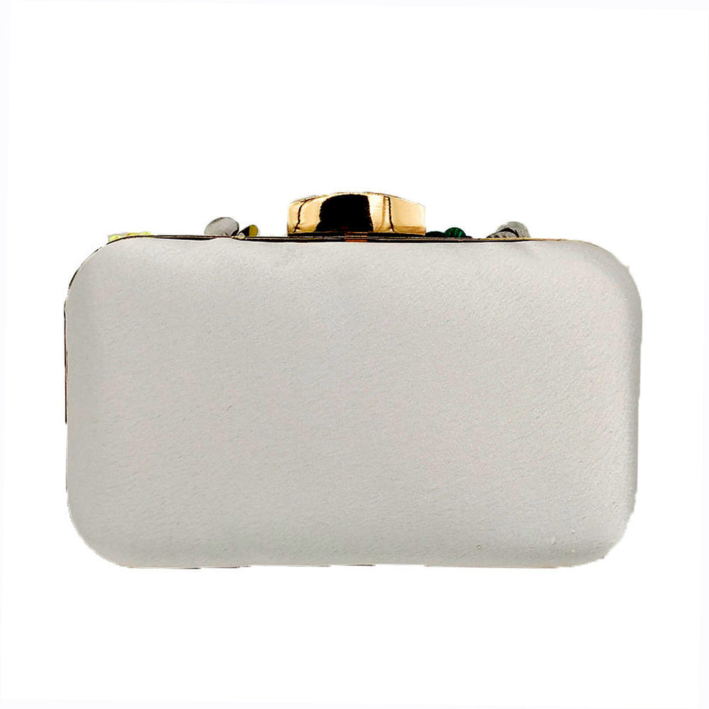 Pochette de soirée à perles et fleurs