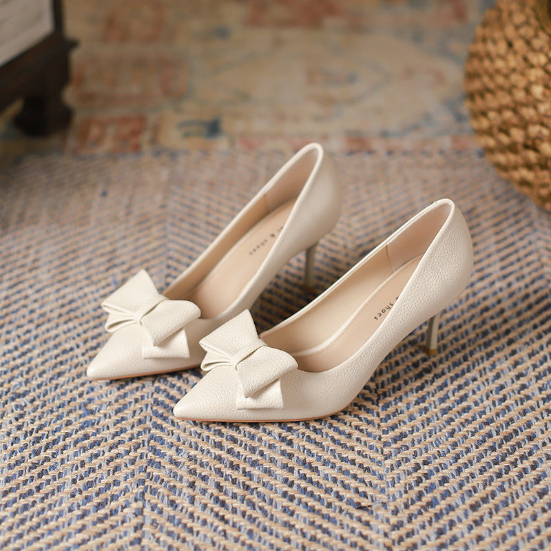 Zapatos de moda con tacón de aguja puntiagudo y lazo poco profundo