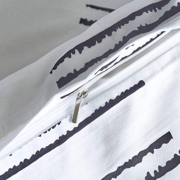 Housse de couette trois pièces pour literie