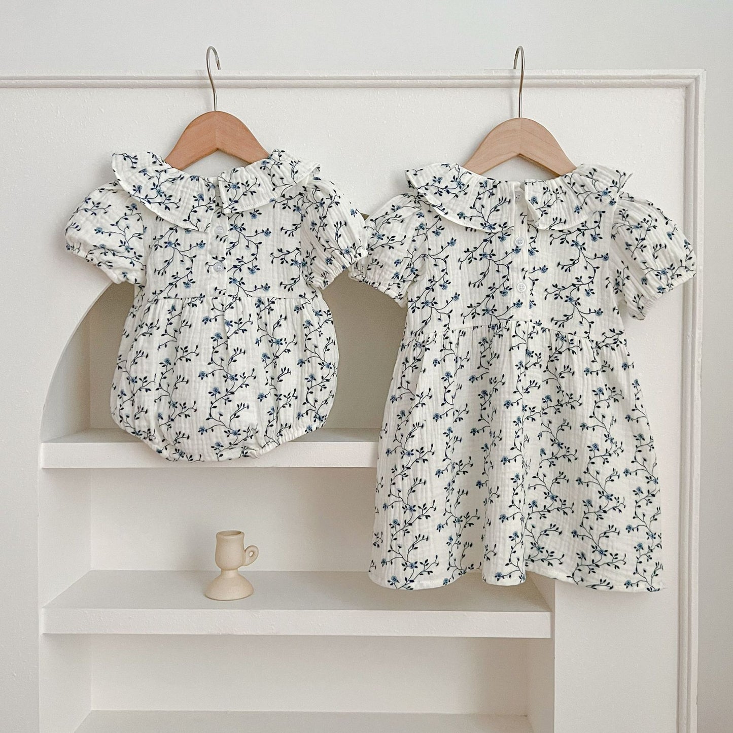 Vestido de niña pequeño con estampado floral y personalidad de moda