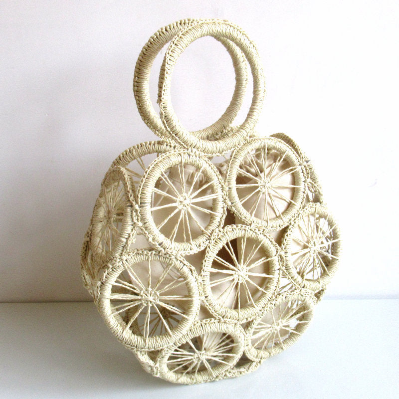 El nuevo bolso tejido con cuerda de papel hueco circular, paja diagonal