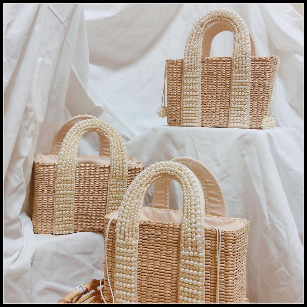 Bolso tejido de paja con perlas en diagonal