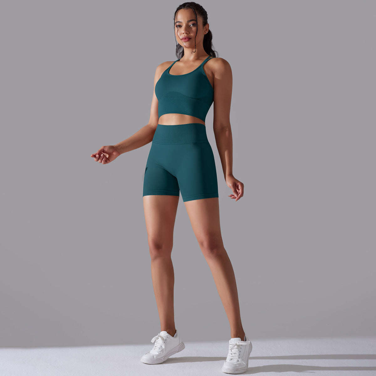 Traje de yoga ajustado deportivo de alta elasticidad con espalda de belleza de color sólido de punto sin costuras