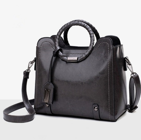 Sac messager simple et tendance en cuir ciré et huilé