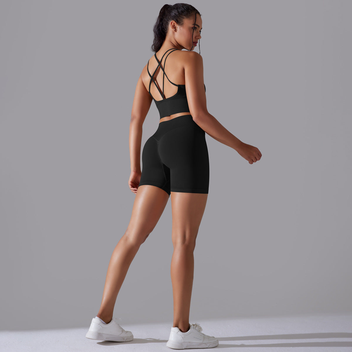 Traje de yoga ajustado deportivo de alta elasticidad con espalda de belleza de color sólido de punto sin costuras