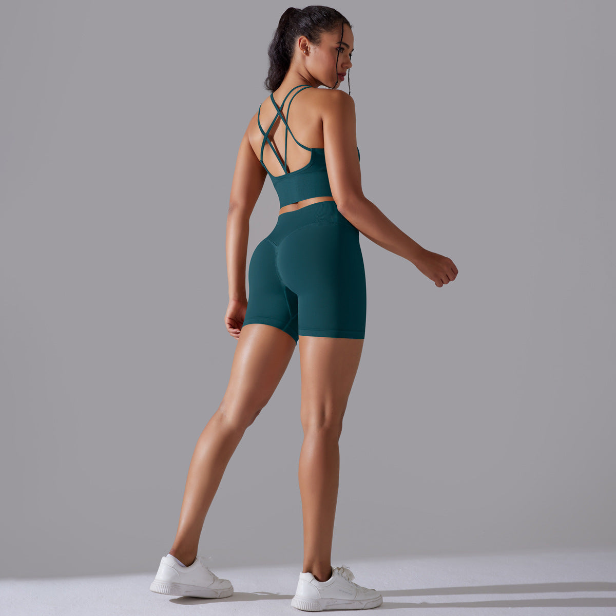 Traje de yoga ajustado deportivo de alta elasticidad con espalda de belleza de color sólido de punto sin costuras