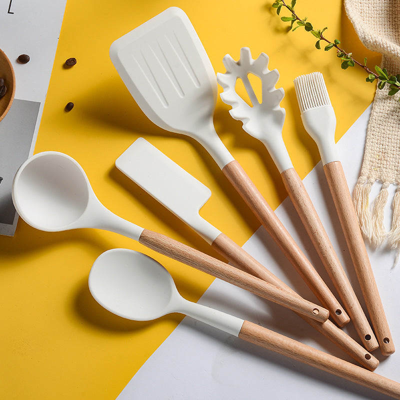 Juego de utensilios de cocina de silicona con mango de madera blanco cremoso