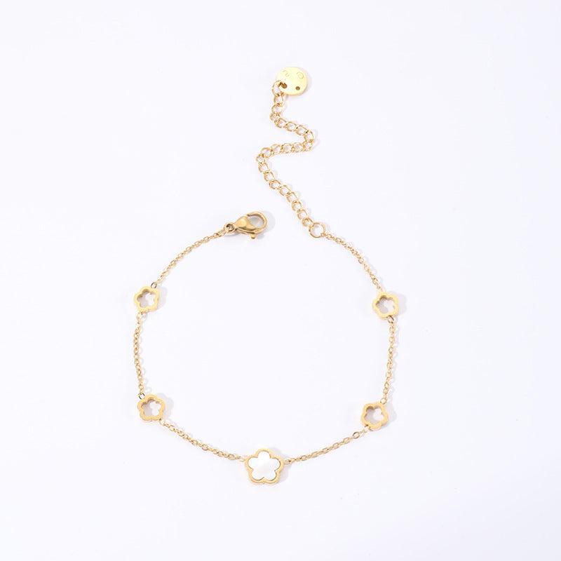 Collier en acier titane et coquillage blanc à cinq feuilles pour femme