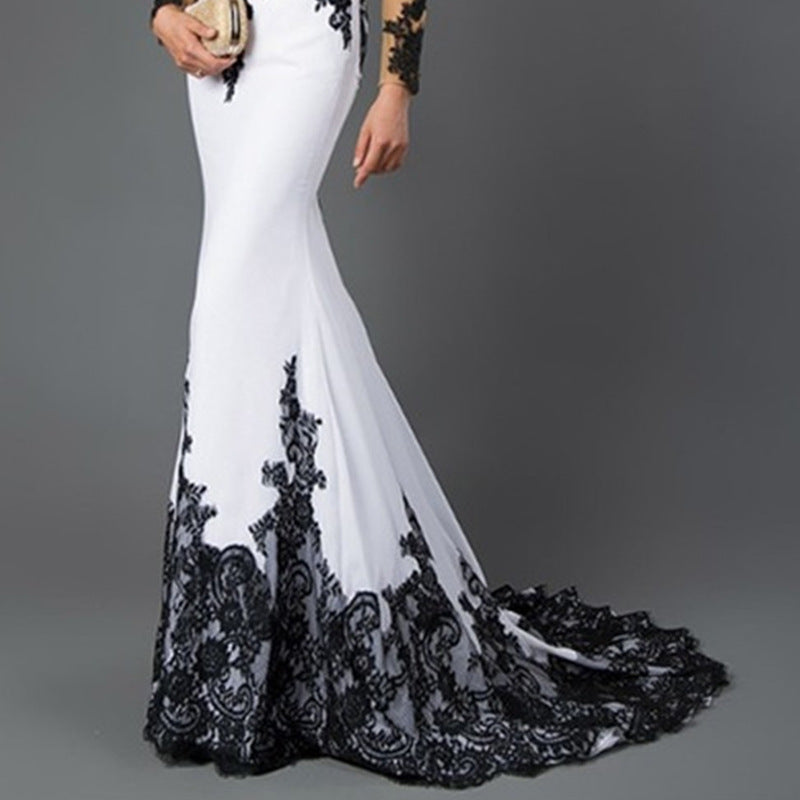 Vestido largo de encaje bordado con cola de pez y cola delgada