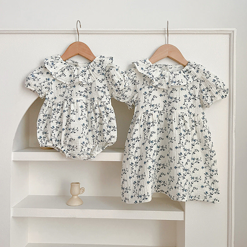 Vestido de niña pequeño con estampado floral y personalidad de moda