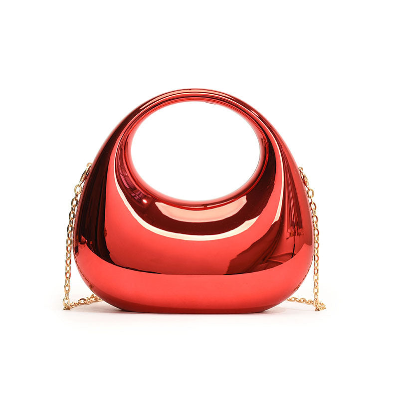 Sac à main en acrylique doré de petite taille avec chaîne oblique