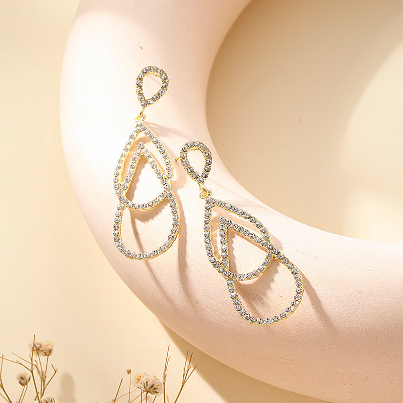 Exquisitos pendientes largos con borlas y gotas de agua de doble capa con temperamento de moda, diseño de nicho, pendientes de sensación de alta gama