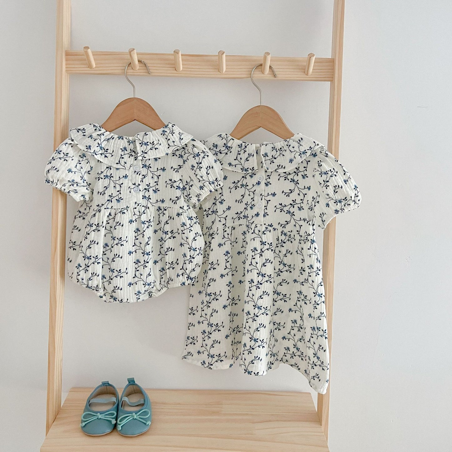 Vestido de niña pequeño con estampado floral y personalidad de moda