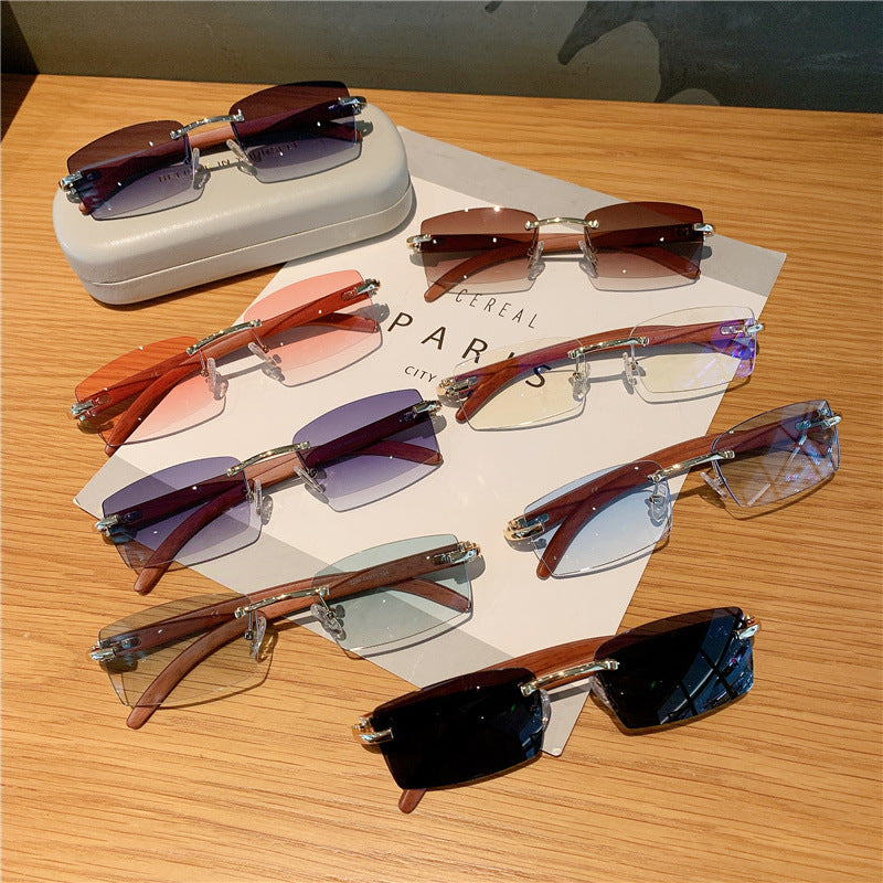 Gafas de sol de moda Gafas de sol sin marco de madera de grano Gafas de sol