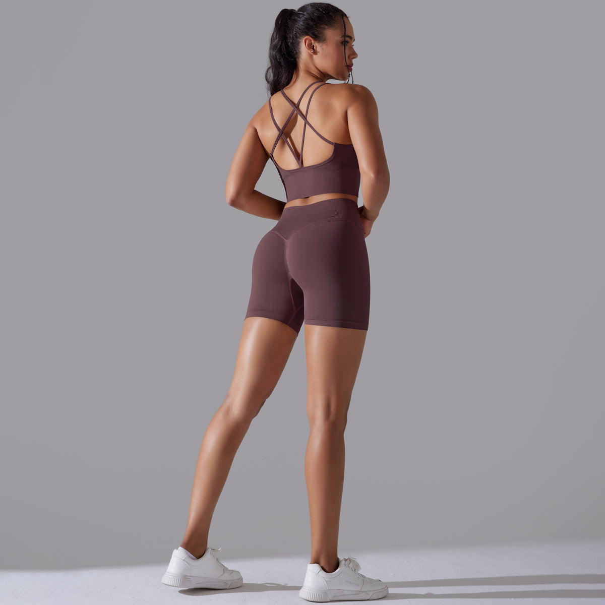Traje de yoga ajustado deportivo de alta elasticidad con espalda de belleza de color sólido de punto sin costuras