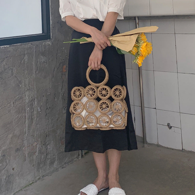 El nuevo bolso tejido con cuerda de papel hueco circular, paja diagonal