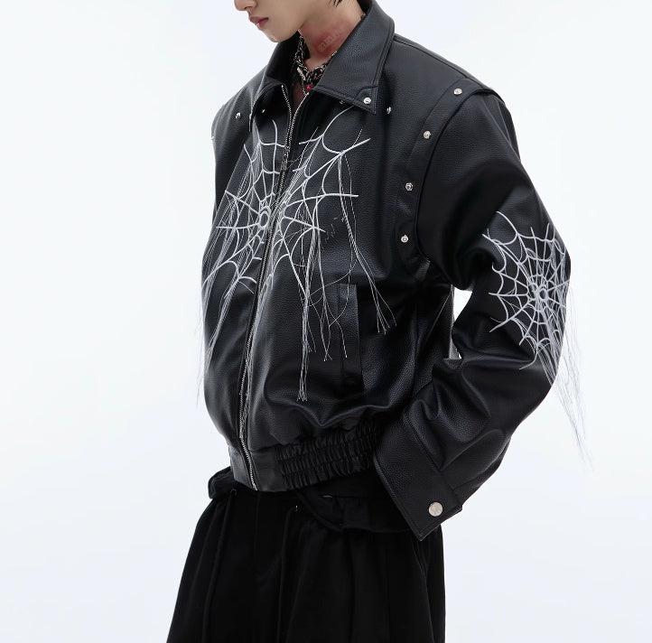 Manteau de moto en cuir à pompons et motif toile d'araignée