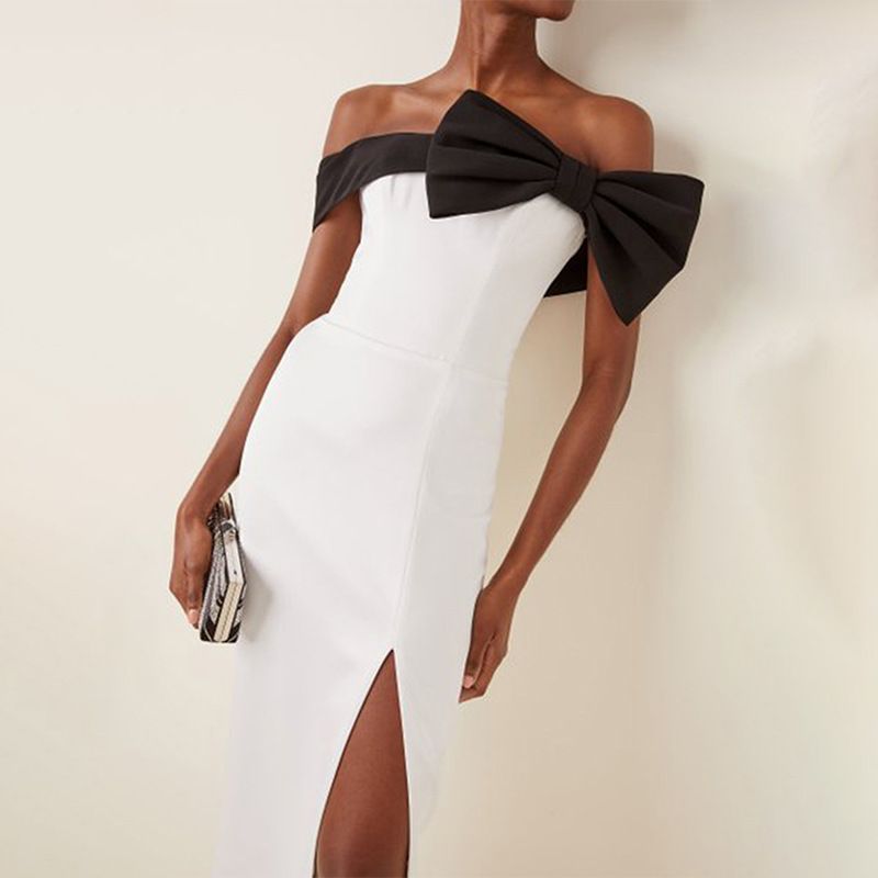 Robe de soirée longue fendue noire et blanche avec nœud