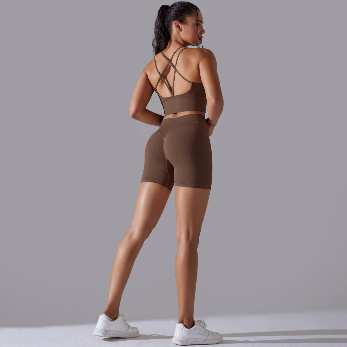 Traje de yoga ajustado deportivo de alta elasticidad con espalda de belleza de color sólido de punto sin costuras