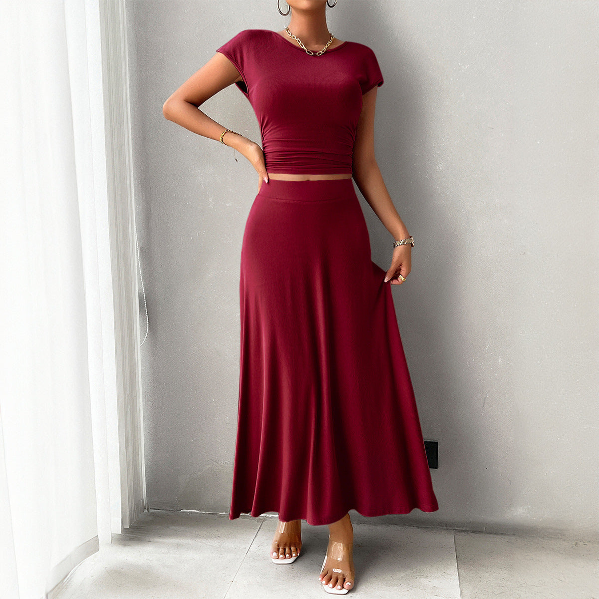 Traje de falda de color puro de manga corta para mujer