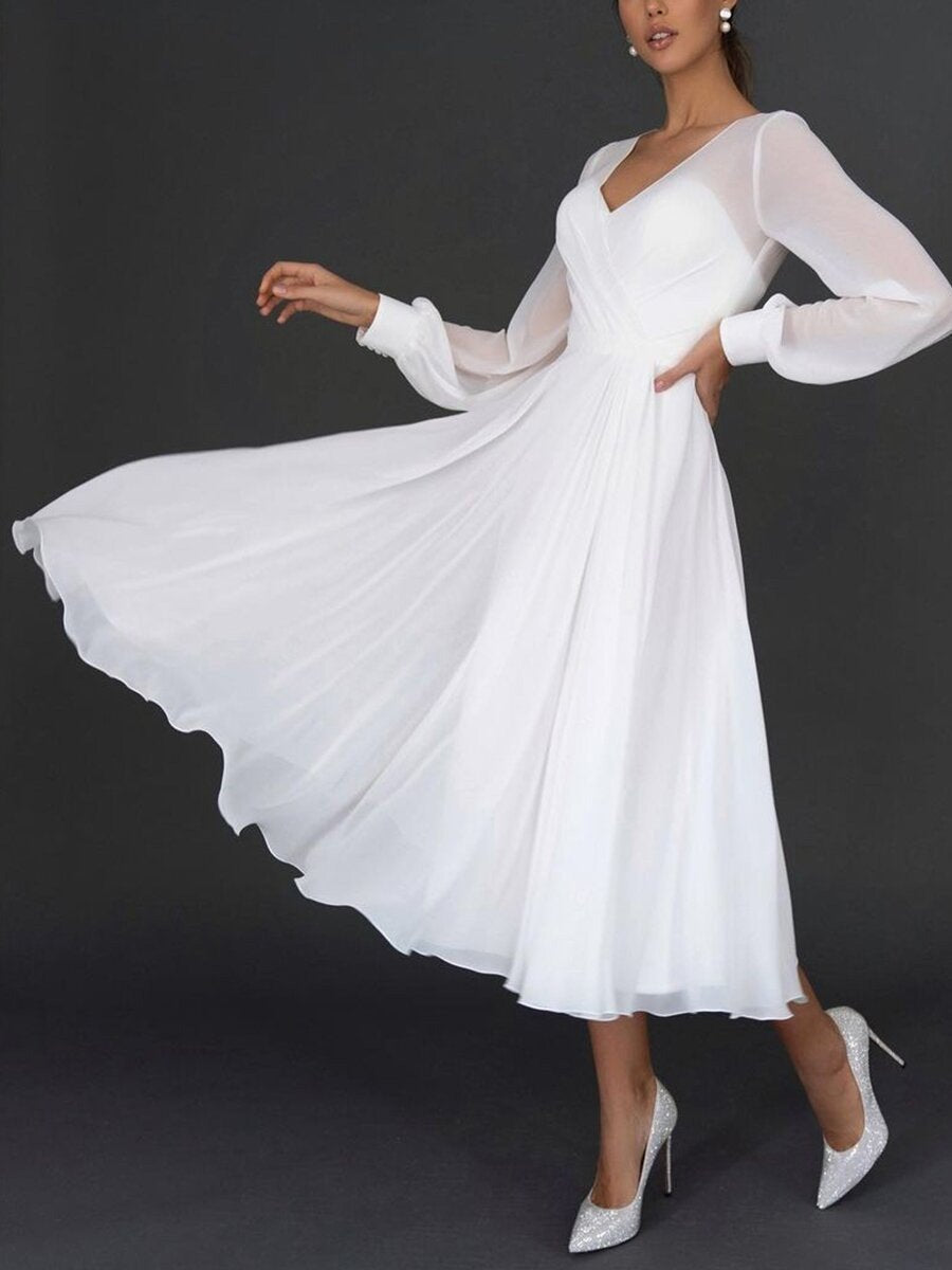 Robe trapèze en mousseline de soie à manches longues