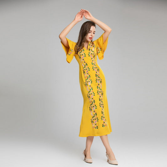 Vestido amarillo con mangas de hoja de loto