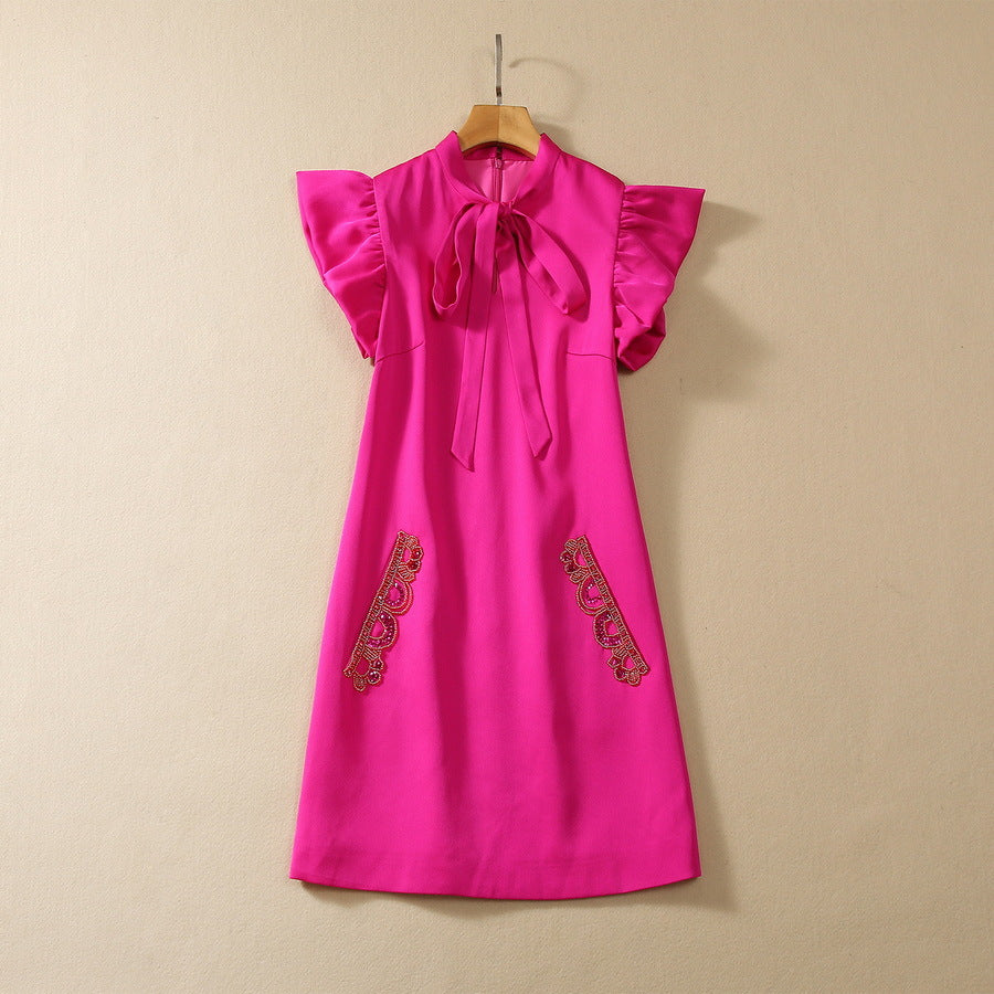 Robe à manches volantées et poches perlées