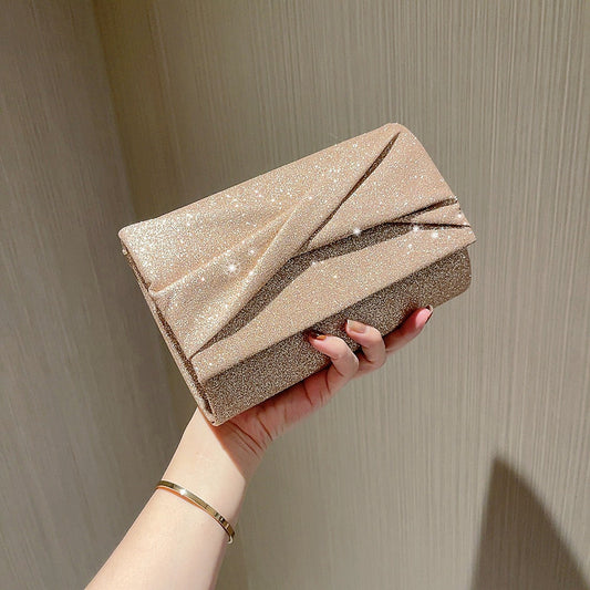 Pochette enveloppe dorée tendance