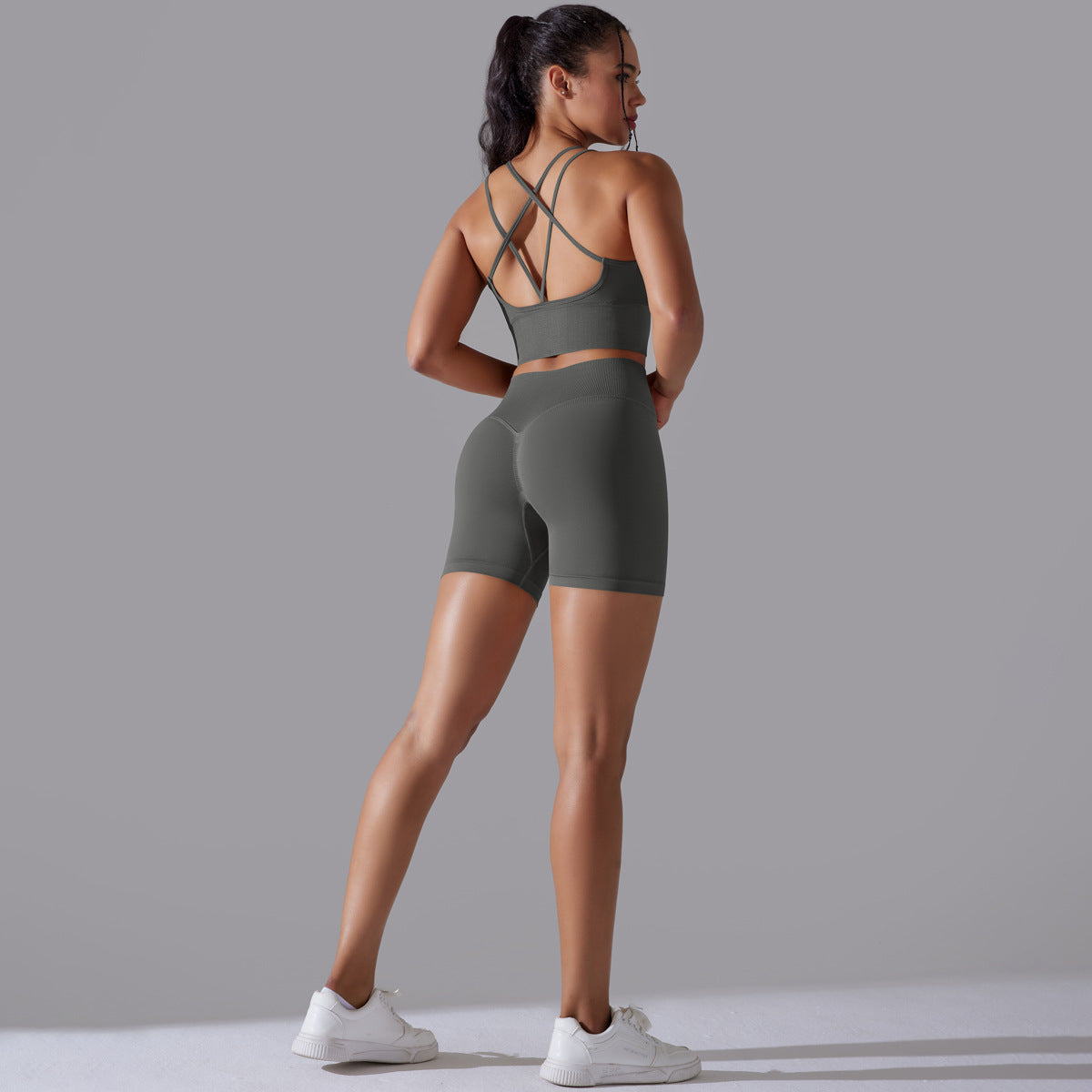 Traje de yoga ajustado deportivo de alta elasticidad con espalda de belleza de color sólido de punto sin costuras