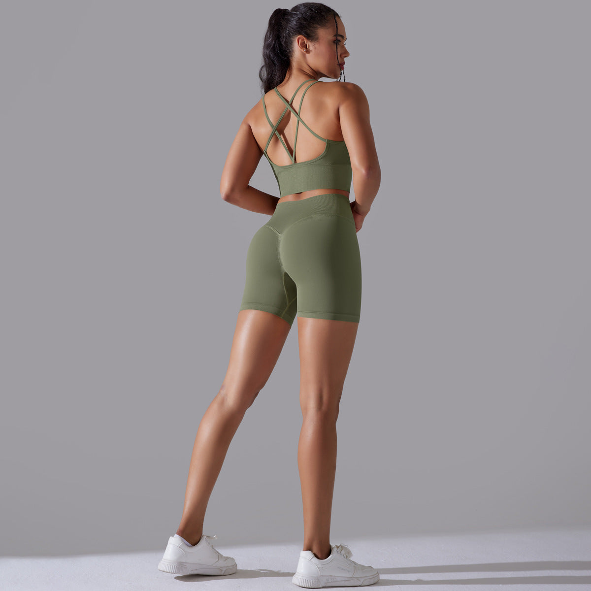 Traje de yoga ajustado deportivo de alta elasticidad con espalda de belleza de color sólido de punto sin costuras