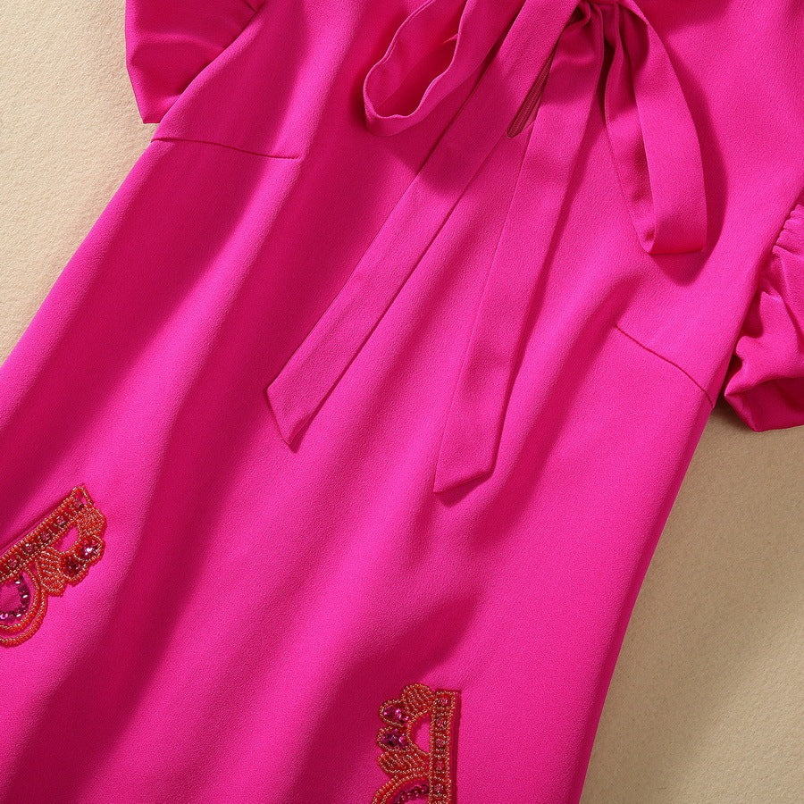 Robe à manches volantées et poches perlées