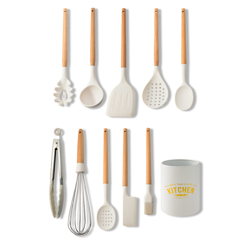 Juego de utensilios de cocina de silicona con mango de madera blanco cremoso
