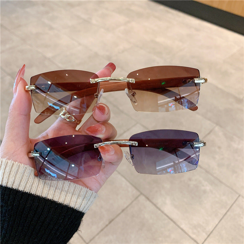 Gafas de sol de moda Gafas de sol sin marco de madera de grano Gafas de sol