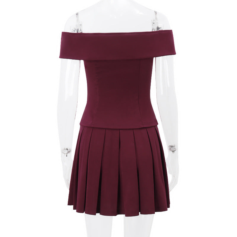 Elegante traje cruzado con top con hombros descubiertos y falda plisada Ropa de mujer