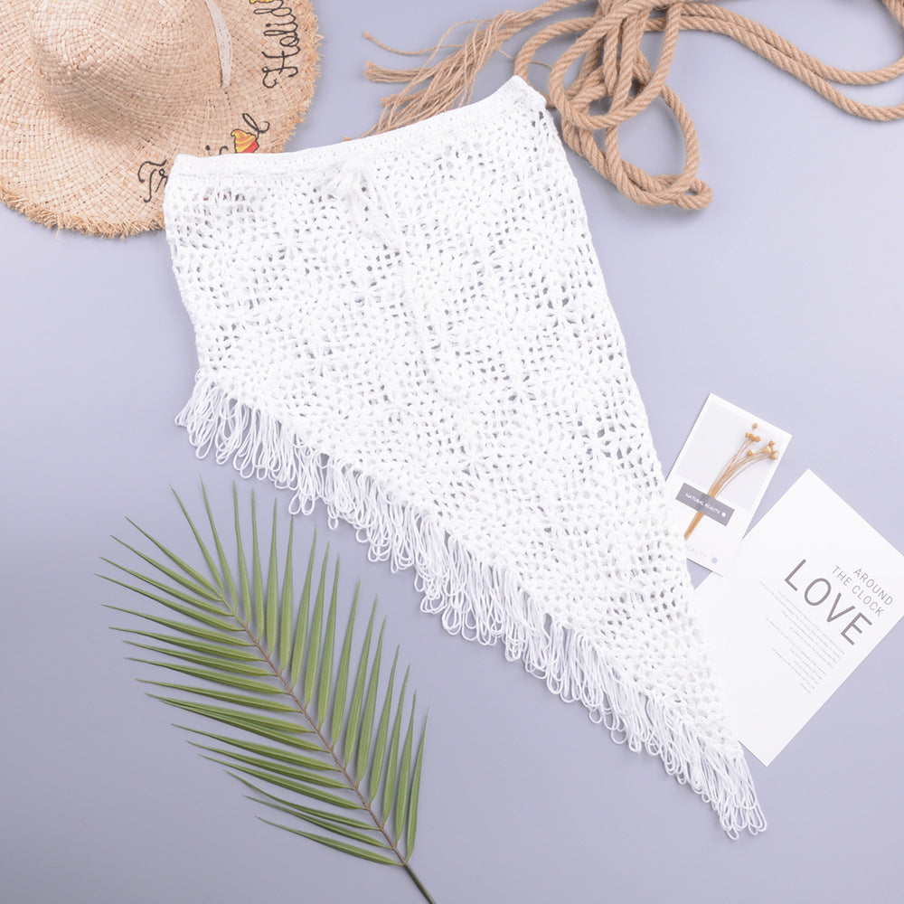 Jupe en maille transparente ajourée à franges inclinées pour femme