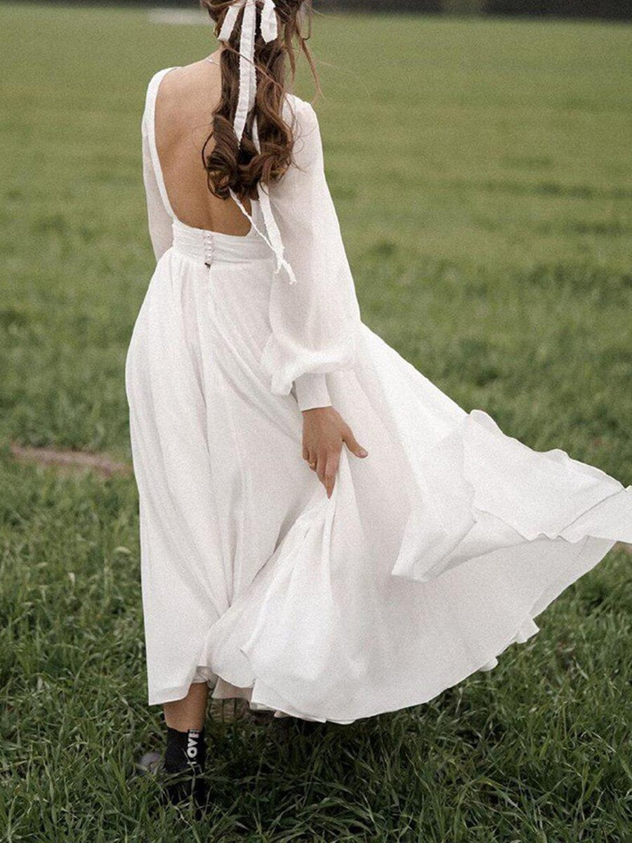 Vestido blanco puro de manga larga con cuello en V y espalda